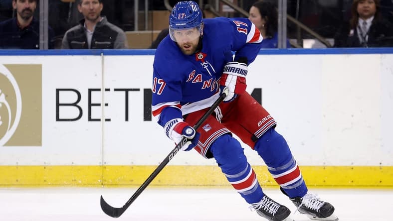 Feb 12, 2024; New York, New York, USA; New York Rangers right wing Blake Wheeler (17) skates with the puck against the Calgary Flames during the first period at Madison Square Garden. Mandatory Credit: Brad Penner-USA TODAY Sports