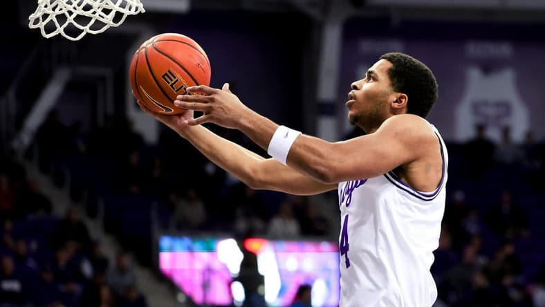 Feb 12, 2024; Fort Worth, Texas, USA;  TCU Horned Frogs guard Jameer Nelson Jr. (4) shoots during the first half against the West Virginia Mountaineers at Ed and Rae Schollmaier Arena. Mandatory Credit: Kevin Jairaj-USA TODAY Sports