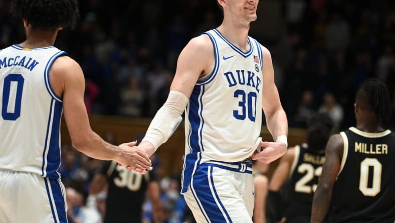 Feb 12, 2024; Durham, North Carolina, USA; Duke Blue Devils center Kyle Filipowski (30) reacts after beating the Wake Forest Deamon Deacons at Cameron Indoor Stadium. The Blue Devils won 77-69. Mandatory Credit: Rob Kinnan-USA TODAY Sports