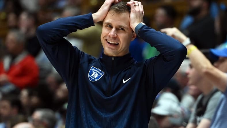Feb 12, 2024; Durham, North Carolina, USA; Duke Blue Devils head coach Jon Scheyer reacts during the second half against the Wake Forest Deamon Deacons at Cameron Indoor Stadium. The Blue Devils won 77-69. Mandatory Credit: Rob Kinnan-USA TODAY Sports