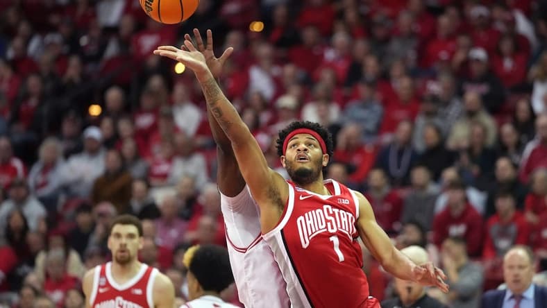 Feb 13, 2024; Madison, Wisconsin, USA; Ohio State Buckeyes guard Roddy Gayle Jr. (1) scores against Wisconsin Badgers guard AJ Storr (2) during the first half at the Kohl Center. Mandatory Credit: Kayla Wolf-USA TODAY Sports