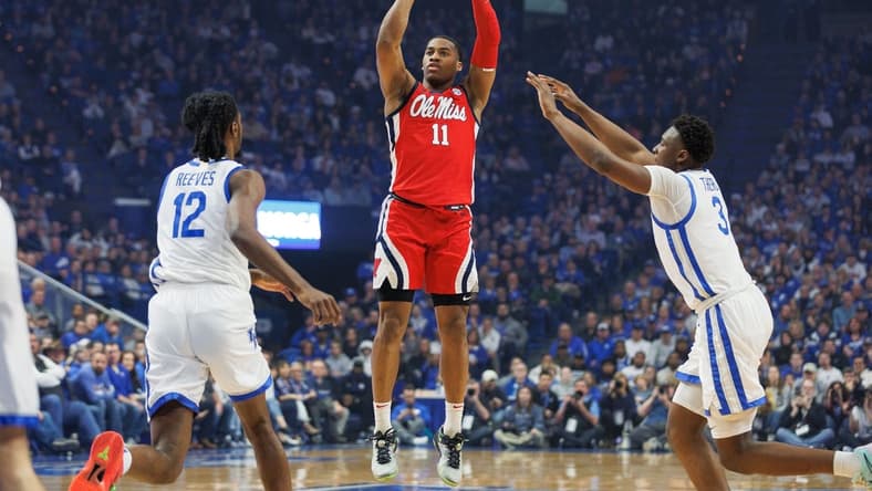 Feb 13, 2024; Lexington, Kentucky, USA; Ole Miss Rebels guard Matthew Murrell (11) makes a three point basket during the first half against the Kentucky Wildcats at Rupp Arena at Central Bank Center. Mandatory Credit: Jordan Prather-USA TODAY Sports