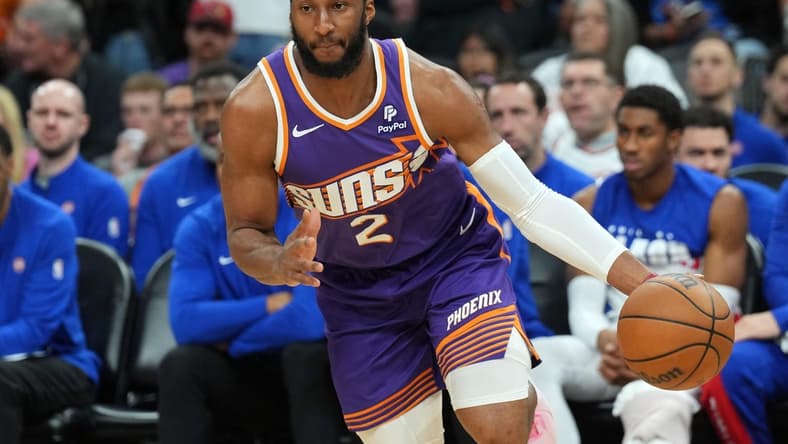 Feb 14, 2024; Phoenix, Arizona, USA; Phoenix Suns forward Josh Okogie (2) dribbles against the Detroit Pistons during the first half at Footprint Center. Mandatory Credit: Joe Camporeale-USA TODAY Sports