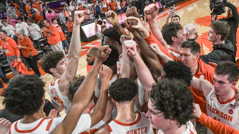Feb 14, 2024; Clemson, South Carolina, USA; Clemson celebrates after the game with Miami at Littlejohn Coliseum Wednesday, February 14, 2024.  Chase Hunter led the Tigers with 20 points in their 77-60 win.  Mandatory Credit: Ken Ruinard-USA TODAY Sports