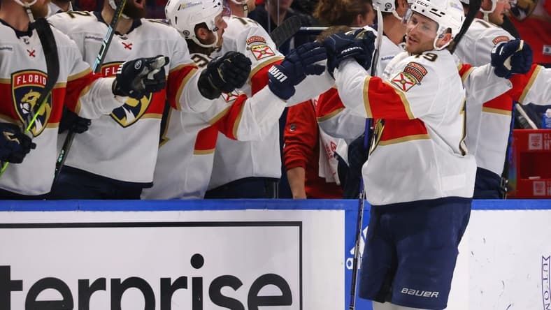 Feb 15, 2024; Buffalo, New York, USA; Florida Panthers left wing Matthew Tkachuk (19) celebrates his goal with teammates during the second period against the Buffalo Sabres at KeyBank Center. Mandatory Credit: Timothy T. Ludwig-USA TODAY Sports