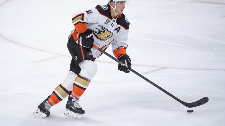 Feb 15, 2024; Ottawa, Ontario, CAN; Anaheim Ducks defenseman Cam Fowler (4) skates with the puck in the third period against the Ottawa Senators at the Canadian Tire Centre. Mandatory Credit: Marc DesRosiers-USA TODAY Sports