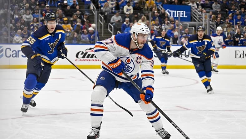 Feb 15, 2024; St. Louis, Missouri, USA; Edmonton Oilers center Connor McDavid (97) controls the puck against the St. Louis Blues during the third period at Enterprise Center. Mandatory Credit: Jeff Curry-USA TODAY Sports