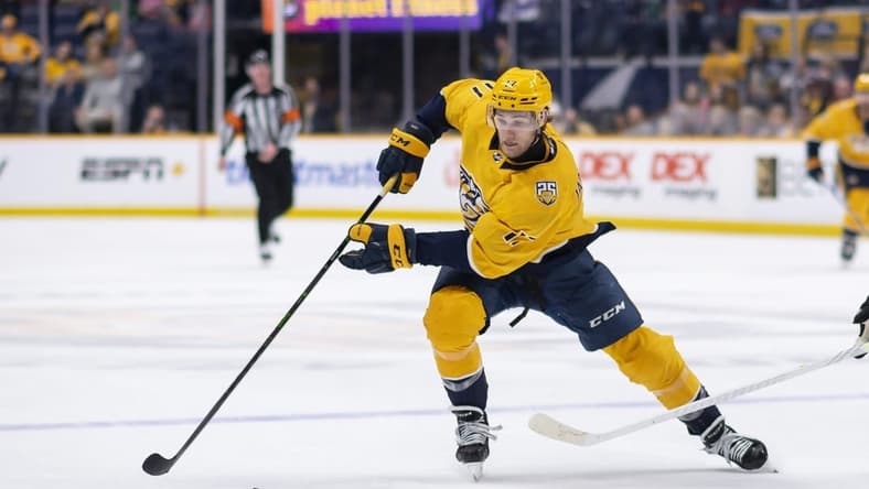 Feb 15, 2024; Nashville, Tennessee, USA; Nashville Predators left wing Mark Jankowski (17) skates with the puck  during the third period at Bridgestone Arena. Mandatory Credit: Steve Roberts-USA TODAY Sports