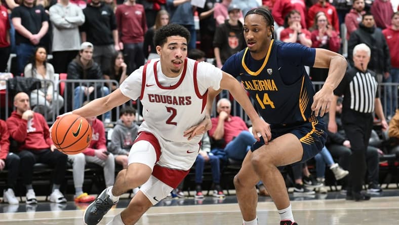 Feb 15, 2024; Pullman, Washington, USA; Washington State Cougars guard Myles Rice (2) runs the baseline against California Golden Bears forward Grant Newell (14) in the second half at Friel Court at Beasley Coliseum. Washington State Cougars won 84-65. Mandatory Credit: James Snook-USA TODAY Sports