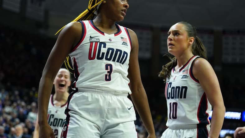 Feb 16, 2024; Storrs, Connecticut, USA; UConn Huskies forward Aaliyah Edwards (3) reacts after blocking a shot from the Georgetown Hoyas in the first half at Harry A. Gampel Pavilion. Mandatory Credit: David Butler II-USA TODAY Sports