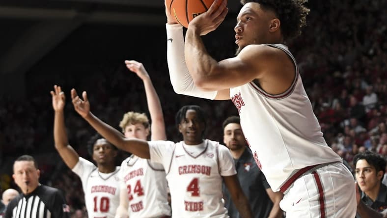 Feb 17, 2024; Tuscaloosa, Alabama, USA; Alabama Crimson Tide guard Mark Sears (1) shoots a three point shot against the Texas A&M Aggies during the second half at Coleman Coliseum. Alabama won 100-75. Mandatory Credit: Gary Cosby Jr.-USA TODAY Sports