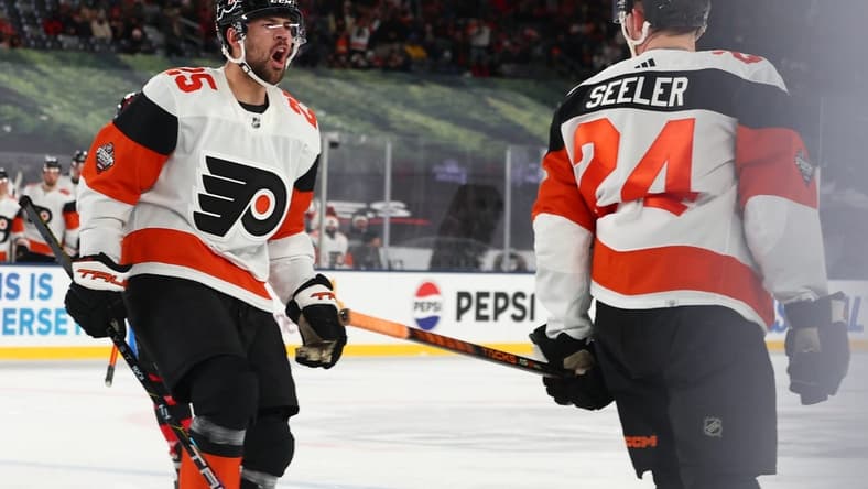 Feb 17, 2024; East Rutherford, New Jersey, USA; Philadelphia Flyers defenseman Nick Seeler (24) celebrates his goal against the Philadelphia Flyers during the third period in a Stadium Series ice hockey game at MetLife Stadium. Mandatory Credit: Ed Mulholland-USA TODAY Sports