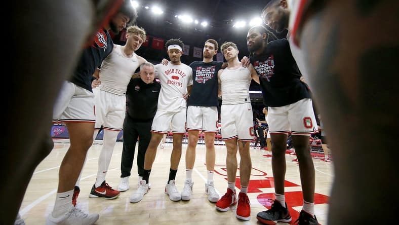 Feb 18, 2024; Columbus, Ohio, USA; Ohio State Buckeyes guard Bowen Hardman (left) and guard Roddy Gayle Jr. (center) and forward Jamison Battle (center right) and guard Colby Baumann (42) huddle up before the game against the Purdue Boilermakers at Value City Arena. Mandatory Credit: Joseph Maiorana-USA TODAY Sports