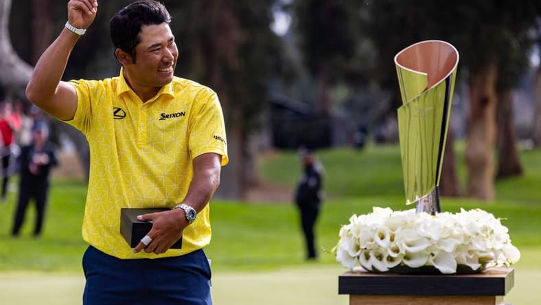 Feb 18, 2024; Pacific Palisades, California, USA; Hideki Matsuyama celebrates after winning The Genesis Invitational golf tournament at Riveria Country Club. Mandatory Credit: Jason Parkhurst-USA TODAY Sports