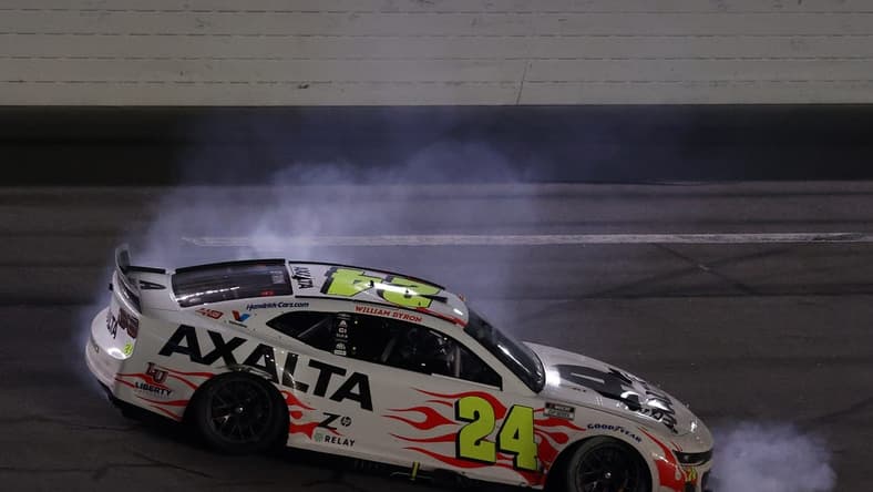 Feb 19, 2024; Daytona Beach, Florida, USA; NASCAR Cup Series driver William Byron (24) does a burn out after winning the Daytona 500 at Daytona International Speedway.  Mandatory Credit: Peter Casey-USA TODAY Sports