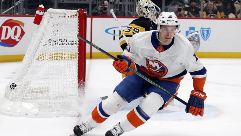 Feb 20, 2024; Pittsburgh, Pennsylvania, USA; New York Islanders center Mathew Barzal (13) reacts after scoring a goal against Pittsburgh Penguins goaltender Alex Nedeljkovic (39) during the second period at PPG Paints Arena. Mandatory Credit: Charles LeClaire-USA TODAY Sports
