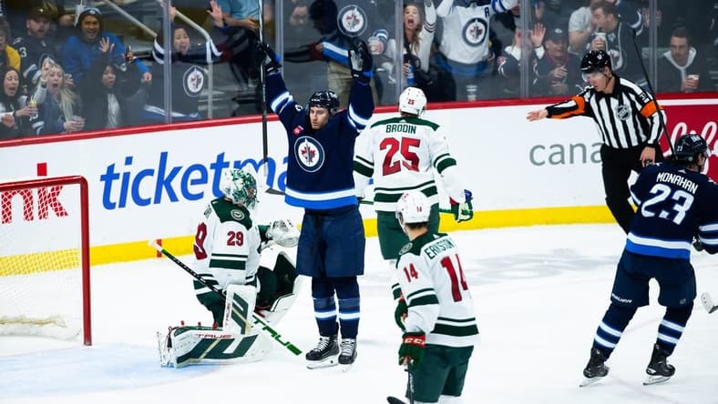 Feb 20, 2024; Winnipeg, Manitoba, CAN; Winnipeg Jets forward Gabriel Vilardi (13) celebrates his goal against the Minnesota Wild during third period at Canada Life Centre. Mandatory Credit: Terrence Lee-USA TODAY Sports