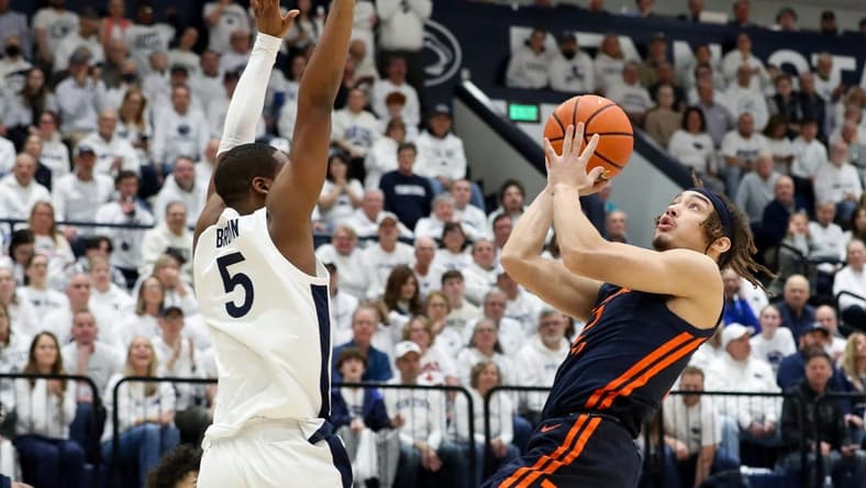 Feb 21, 2024; University Park, Pennsylvania, USA; Illinois Fighting Illini guard Dra Gibbs-Lawhorn (2) drives against Penn State Nittany Lions guard Jameel Brown (5) during the first half at Rec Hall. Mandatory Credit: Matthew O'Haren-USA TODAY Sports