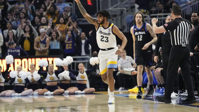 Feb 21, 2024; Milwaukee, Wisconsin, USA;  Marquette Golden Eagles forward David Joplin (23) celebrates after scoring a basket during the first half against the DePaul Blue Demons at Fiserv Forum. Mandatory Credit: Jeff Hanisch-USA TODAY Sports