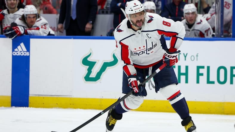 Feb 22, 2024; Tampa, Florida, USA; Washington Capitals left wing Alex Ovechkin (8) shoots the puck against the Tampa Bay Lightning in the second period at Amalie Arena. Mandatory Credit: Nathan Ray Seebeck-USA TODAY Sports