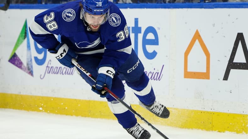 Feb 22, 2024; Tampa, Florida, USA; Tampa Bay Lightning left wing Brandon Hagel (38) controls the puck against the Washington Capitals in the second period at Amalie Arena. Mandatory Credit: Nathan Ray Seebeck-USA TODAY Sports