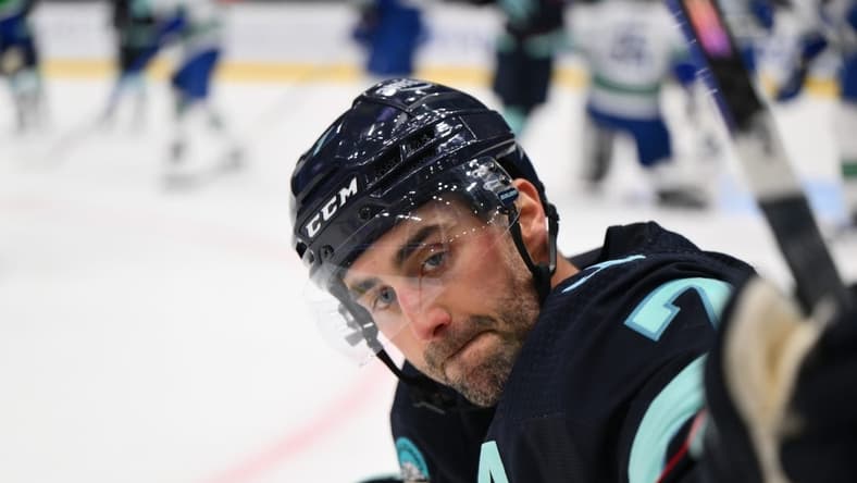Feb 22, 2024; Seattle, Washington, USA; Seattle Kraken right wing Jordan Eberle (7) celebrates scoring a goal against the Vancouver Canucks during the second period at Climate Pledge Arena. Mandatory Credit: Steven Bisig-USA TODAY Sports
