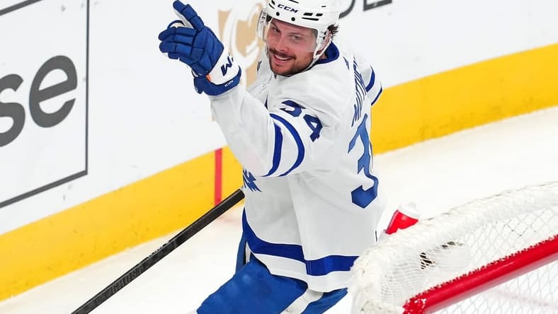 Feb 22, 2024; Las Vegas, Nevada, USA; Toronto Maple Leafs center Auston Matthews (34) celebrates after scoring a goal against the Vegas Golden Knights during the third period at T-Mobile Arena. Mandatory Credit: Stephen R. Sylvanie-USA TODAY Sports