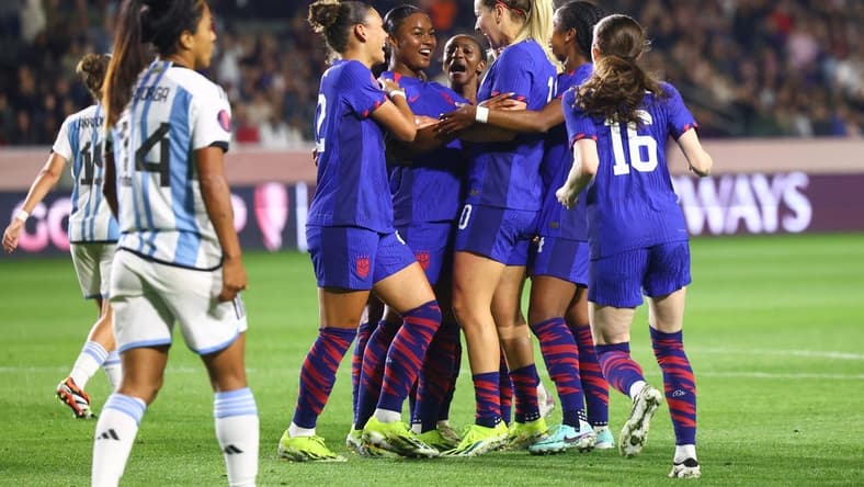 Feb 23, 2024; Carson, California, USA; United States midfielder Jaedyn Shaw (8) celebrates with teammates after scoring a goal against Argentina during the first half at Dignity Health Sports Park. Mandatory Credit: Jessica Alcheh-USA TODAY Sports