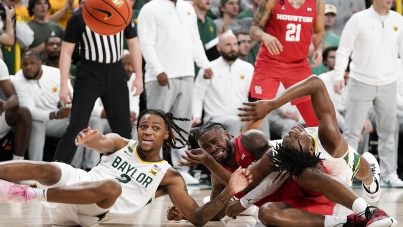Feb 24, 2024; Waco, Texas, USA; Baylor Bears guard Jayden Nunn (2) and Baylor Bears guard Ja'Kobe Walter (4) battle with Houston Cougars guard Jamal Shead (1) for the loose ball during the first half at Paul and Alejandra Foster Pavilion. Mandatory Credit: Raymond Carlin III-USA TODAY Sports