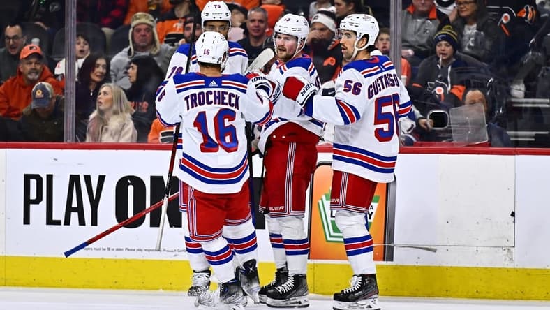 Feb 24, 2024; Philadelphia, Pennsylvania, USA; New York Rangers left wing Alexis Lafreniere (13) celebrates with teammates after scoring a goal against the Philadelphia Flyers in the second period at Wells Fargo Center. Mandatory Credit: Kyle Ross-USA TODAY Sports