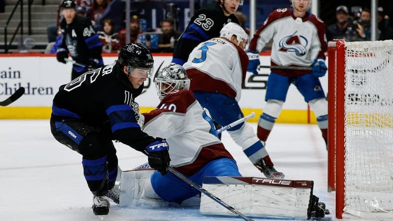 Feb 24, 2024; Denver, Colorado, USA; Colorado Avalanche goaltender Alexandar Georgiev (40) makes a save against Toronto Maple Leafs right wing Mitchell Marner (16) in the first period at Ball Arena. Mandatory Credit: Isaiah J. Downing-USA TODAY Sports