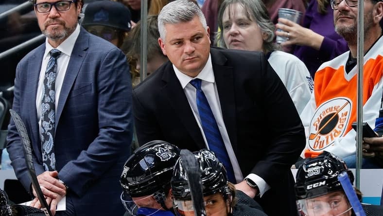 Feb 24, 2024; Denver, Colorado, USA; Toronto Maple Leafs head coach Sheldon Keefe looks on in the first period against the Colorado Avalanche at Ball Arena. Mandatory Credit: Isaiah J. Downing-USA TODAY Sports