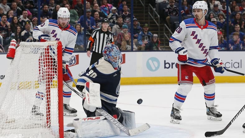 Feb 25, 2024; Columbus, Ohio, USA; Columbus Blue Jackets goalie Elvis Merzlikins (90) makes a save against the New York Rangers during the third period at Nationwide Arena. Mandatory Credit: Russell LaBounty-USA TODAY Sports