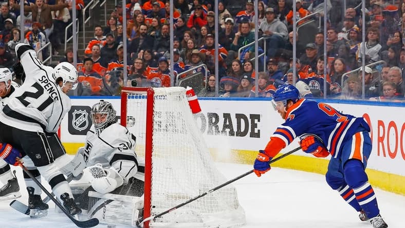 Feb 26, 2024; Edmonton, Alberta, CAN; Edmonton Oilers forward Connor McDavid (97) tries a wrap-around on Los Angeles Kings goaltender David Rittich (31) during the second period at Rogers Place. Mandatory Credit: Perry Nelson-USA TODAY Sports