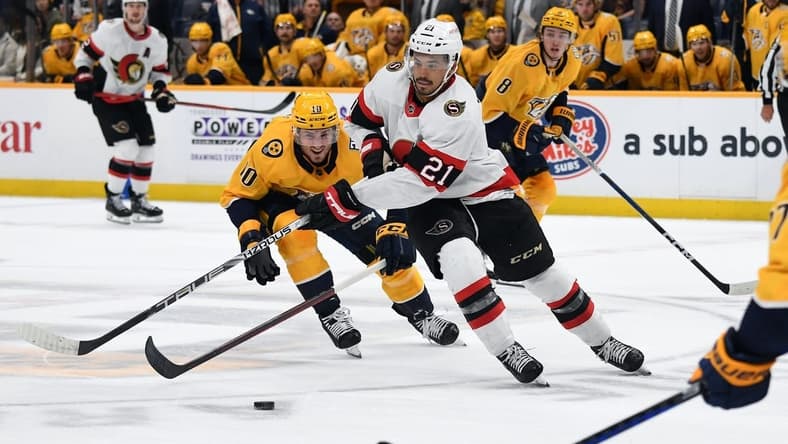 Feb 27, 2024; Nashville, Tennessee, USA; Ottawa Senators right wing Mathieu Joseph (21) handles the puck in the offensive zone during the second period against the Nashville Predators at Bridgestone Arena. Mandatory Credit: Christopher Hanewinckel-USA TODAY Sports