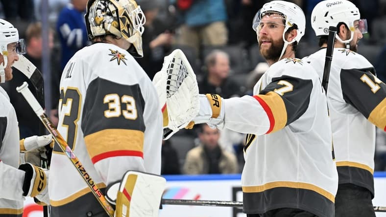 Feb 27, 2024; Toronto, Ontario, CAN; Vegas Golden Knights defenseman Alex Pietrangelo (7) bumps gloves with goalie Adin Hill (33) as they celebrate a win over the Toronto Maple Leafs at Scotiabank Arena. Mandatory Credit: Dan Hamilton-USA TODAY Sports