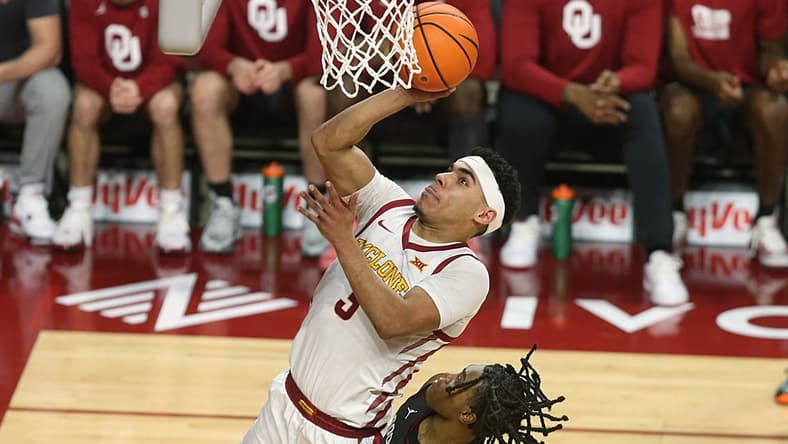 Iowa State Cyclones guard Tamin Lipsey (3) takes a shoot around Oklahoma Sooners guard Rivaldo Soares (5) during the first half in the Big-12 conference showdown at Hilton Coliseum on Wednesday, Feb. 28, 2024, in Ames, Iowa.