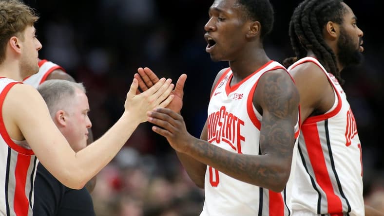Feb 29, 2024; Columbus, Ohio, USA; Ohio State Buckeyes guard Scotty Middleton (0) celebrates with teammates during the first half against the Nebraska Cornhuskers at Value City Arena. Mandatory Credit: Joseph Maiorana-USA TODAY Sports
