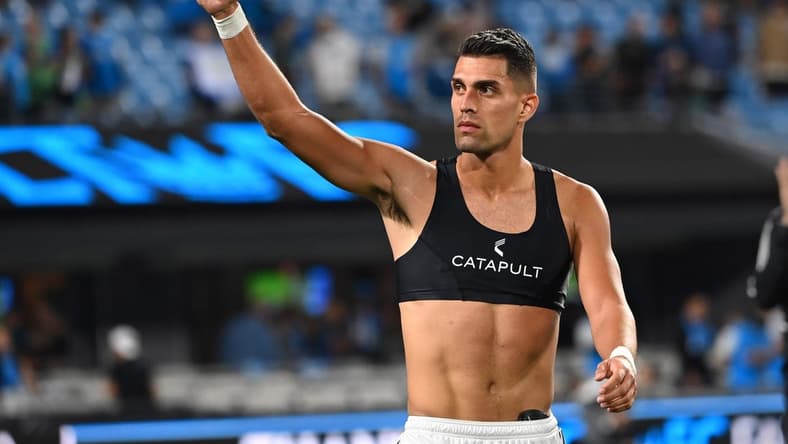 Oct 5, 2022; Charlotte, North Carolina, USA; Charlotte FC forward Daniel Rios (12) signals to the fans after the game at Bank of America Stadium. Mandatory Credit: Bob Donnan-USA TODAY Sports