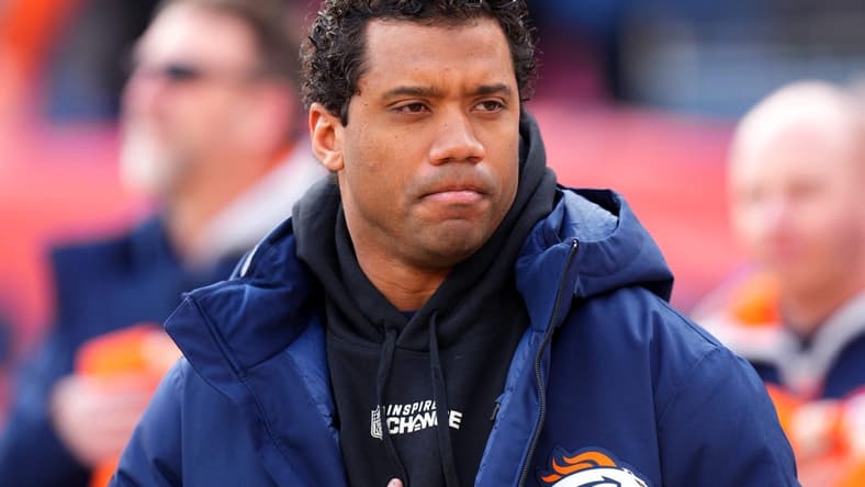 Dec 18, 2022; Denver, Colorado, USA; Denver Broncos quarterback Russell Wilson (3) on the sidelines before the start of the game against the Arizona Cardinals at Empower Field at Mile High. Mandatory Credit: Ron Chenoy-USA TODAY Sports