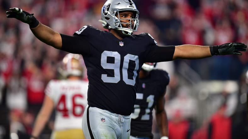 January 1, 2023; Paradise, Nevada, USA; Las Vegas Raiders defensive tackle Jerry Tillery (90) reacts after San Francisco 49ers place kicker Robbie Gould (9) misses a field goal during the second half at Allegiant Stadium. Mandatory Credit: Gary A. Vasquez-USA TODAY Sports