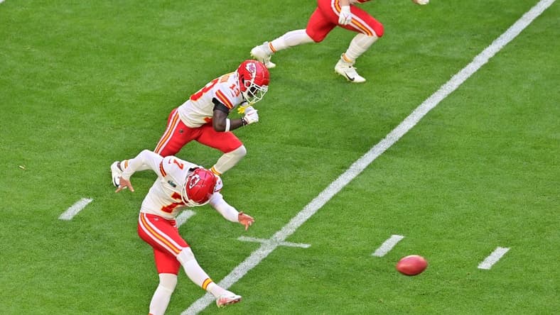 Feb 12, 2023; Glendale, Arizona, US; Kansas City Chiefs place kicker Harrison Butker (7) kicks off against the Philadelphia Eagles to start Super Bowl LVII at State Farm Stadium. Mandatory Credit: Matt Kartozian-USA TODAY Sports