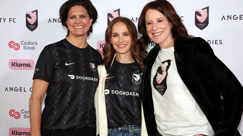Mar 26, 2023; Los Angeles, California, USA; Angel City FC co-founder Julie Uhrman (left) and co-founder Natalie Portman (center) and co-founder Kara Nortman pose for a photo on the pink carpet before the game against New Jersey/New York Gotham FC at BMO Stadium. Mandatory Credit: Kiyoshi Mio-USA TODAY Sports