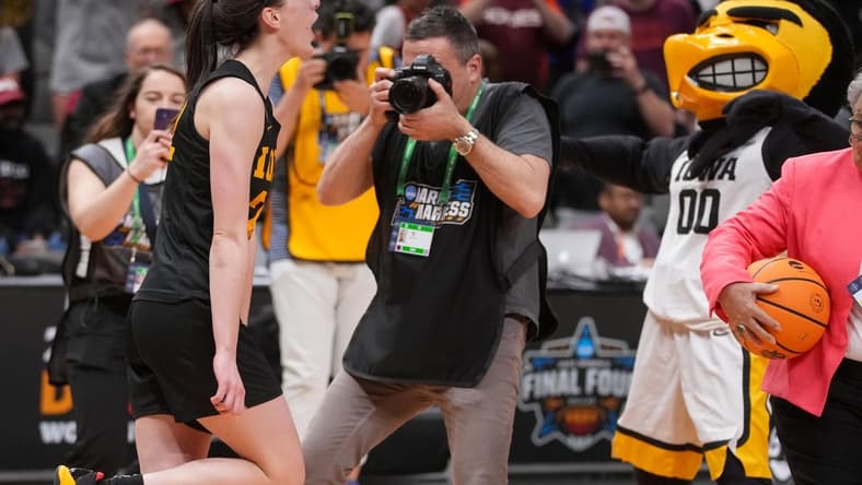 Iowa guard Caitlin Clark (22) celebrates a win over South Carolina during the 2023 NCAA Women's Final Four.