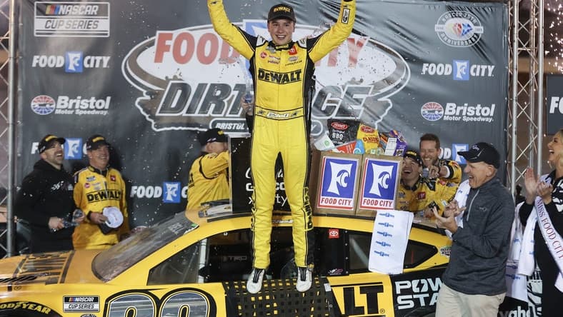 Apr 9, 2023; Bristol, Tennessee, USA; NASCAR Cup Series driver Christopher Bell (20) wins the Food City Dirt Race at the Bristol Motor Speedway Dirt Course. Mandatory Credit: Randy Sartin-USA TODAY Sports