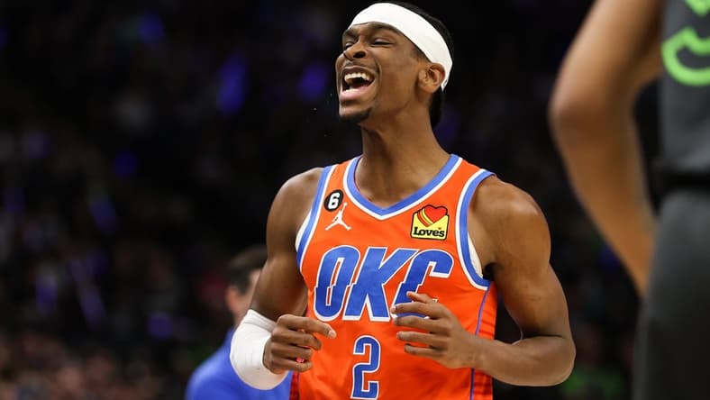 Apr 14, 2023; Minneapolis, Minnesota, USA; Oklahoma City Thunder guard Shai Gilgeous-Alexander (2) reacts to his shot against the Minnesota Timberwolves during the first quarter at Target Center. Mandatory Credit: Matt Krohn-USA TODAY Sports