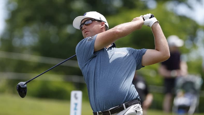 May 27, 2023; Potomac Falls, Virginia, USA; Andy Ogletree hits his tee shot on the second hole during the second round of LIV Golf Washington, D.C. golf tournament at Trump National. Mandatory Credit: Geoff Burke-USA TODAY Sports