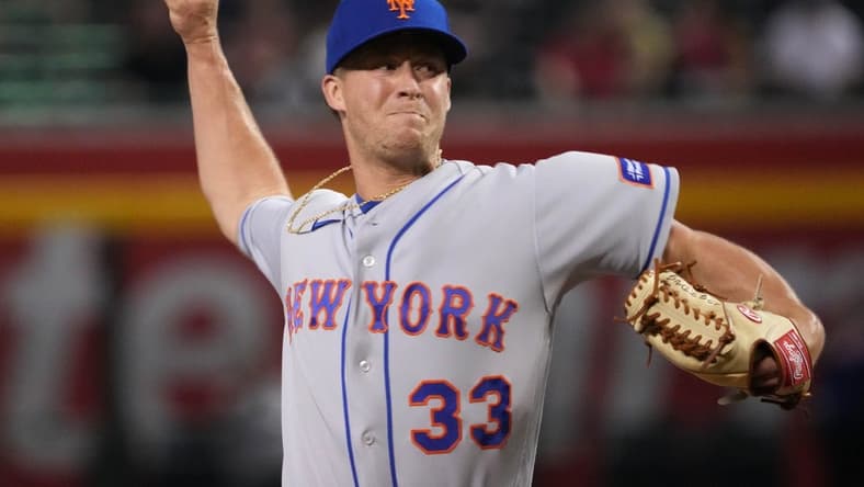 Jul 6, 2023; Phoenix, Arizona, USA; New York Mets relief pitcher Trevor Gott (33) pitches against the Arizona Diamondbacks during the ninth inning at Chase Field. Mandatory Credit: Joe Camporeale-USA TODAY Sports