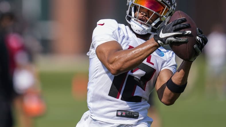 Jul 28, 2023; Flowery Branch, GA, USA; Atlanta Falcons wide receiver KhaDarel Hodge (12) catches a pass during training camp at IBM Performance Field. Mandatory Credit: Dale Zanine-USA TODAY Sports