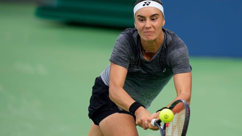 Anhelina Kalinina returns a shot in the third set of the Round of 32 match between Ons Jaebeur (TUN) and Anhelina Kalinina (Ukraine) in the Western & Southern Open at the Lindner Family Tennis Center in Mason, Ohio, on Tuesday, Aug. 15, 2023. Jaebeur won the match, 6-3, 6-7, 7-6.